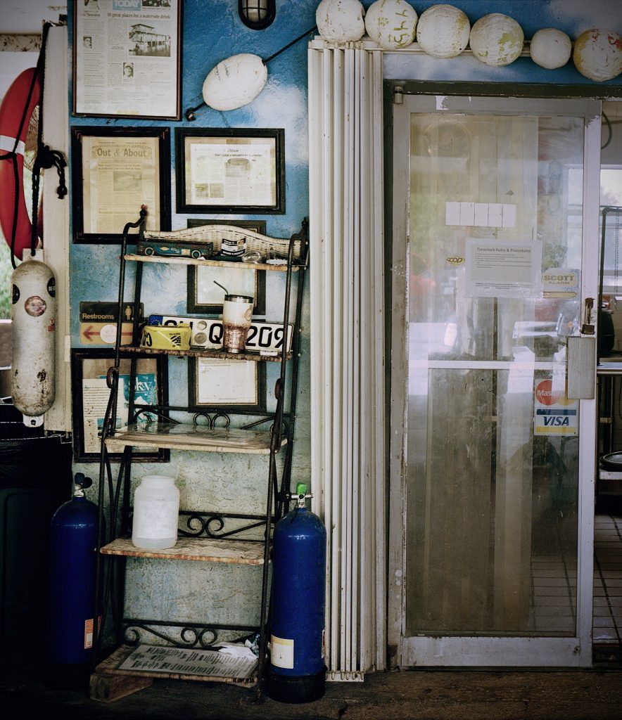 Old kitchen entrance in an even older restaurant. Captured on film