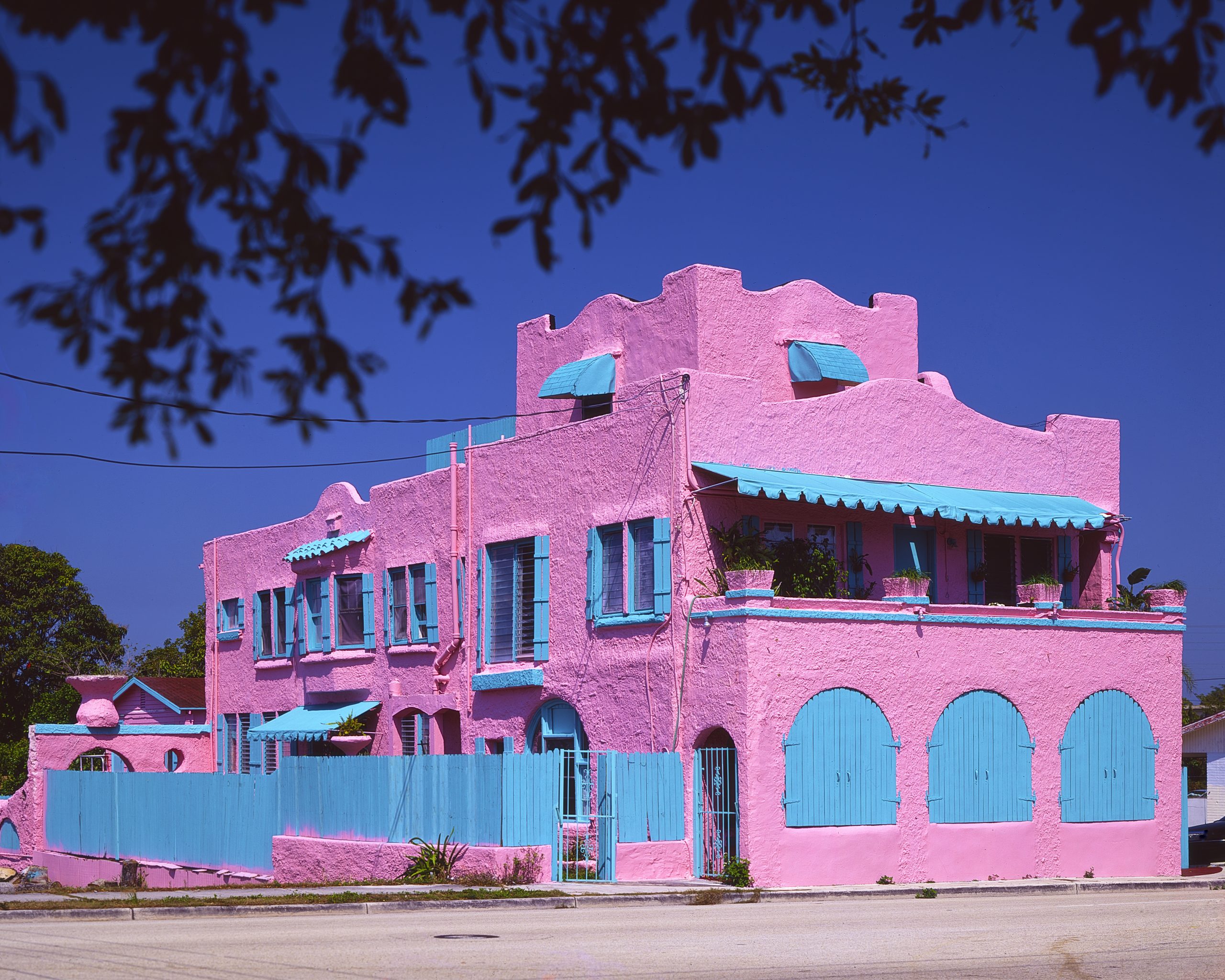 Pink and teal building - West Palm Beach, Florida. Captured on Film